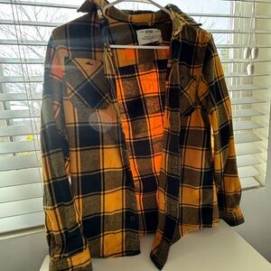 A black and yellow plaid boy sweater